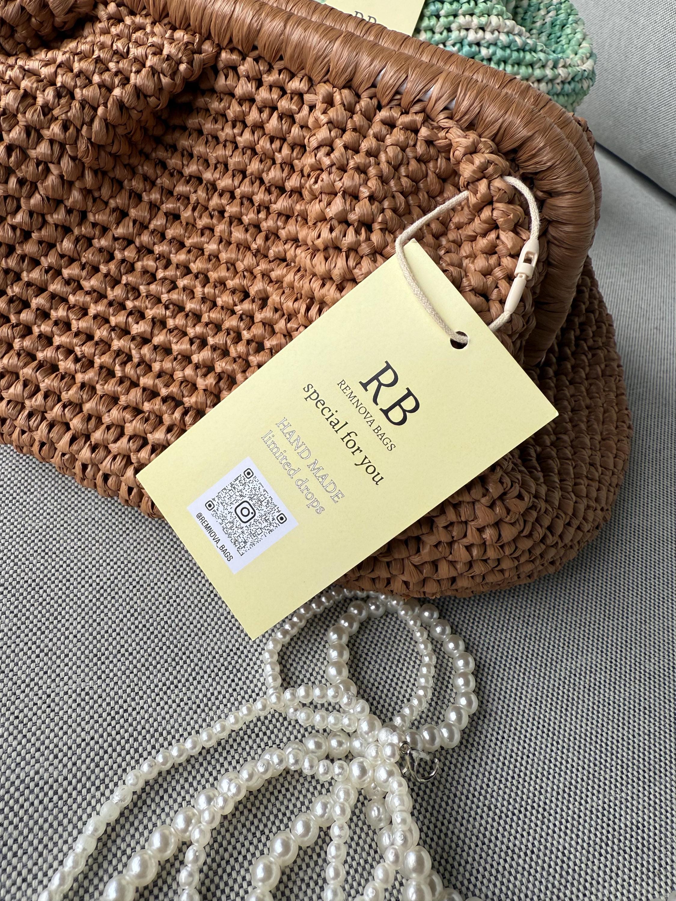 RAFFIA POUCH CLUTCH — BROWN
