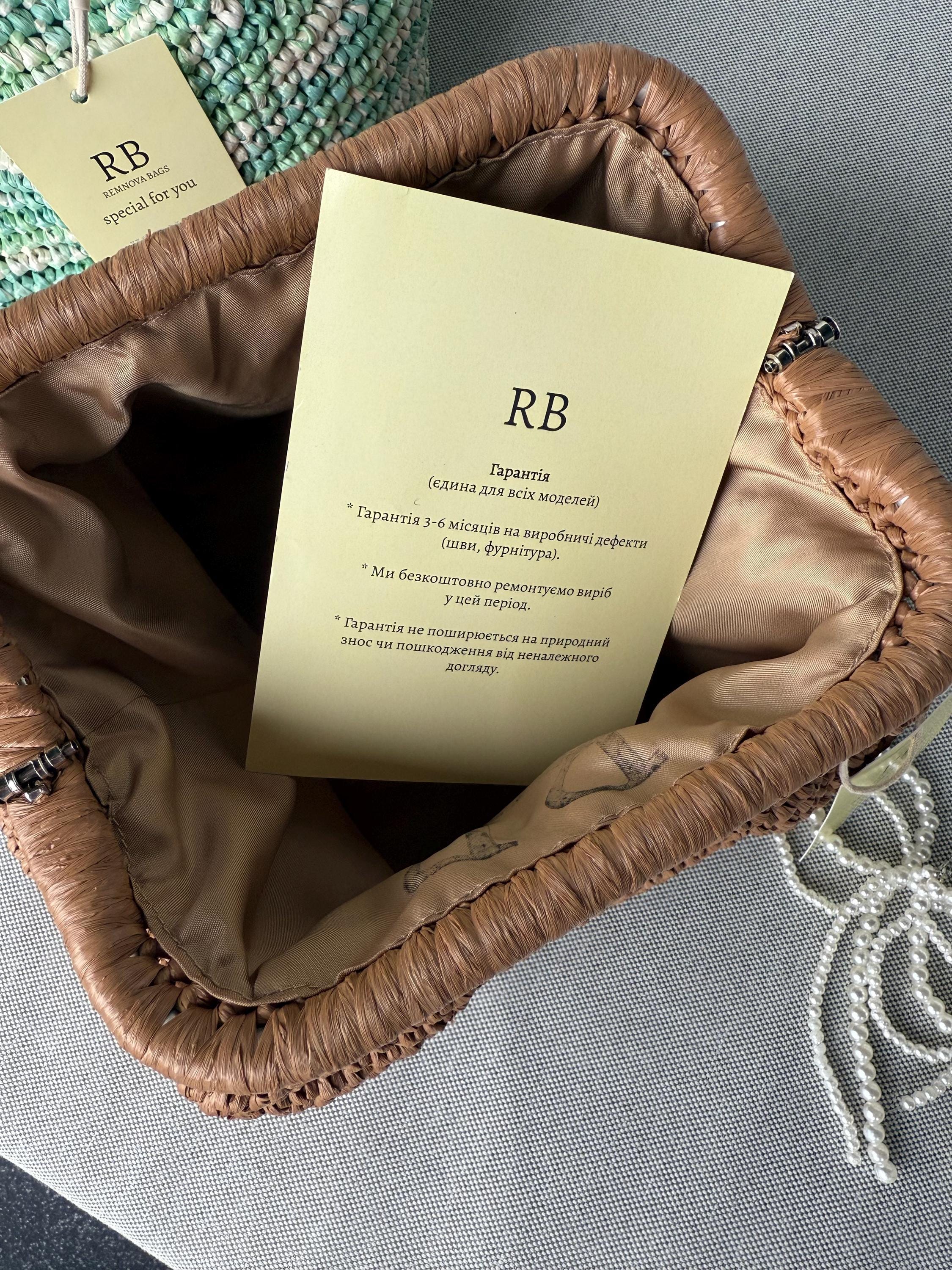RAFFIA POUCH CLUTCH — BROWN